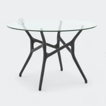 שולחן אוכל עגול | דגם מילאן | פלטה זכוכית עגולה | רגל עץ מעוצבת בגוון שחור